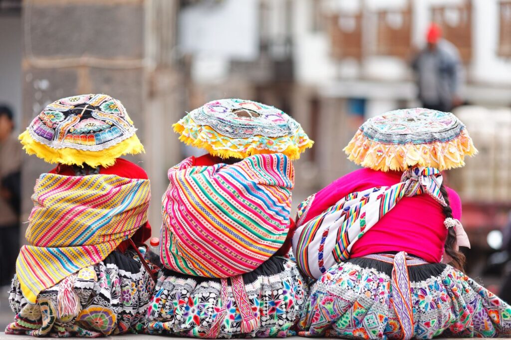 pexels-photo-26927090-2 Colorful traditional costumes worn at a festival in Cusco, Peru.