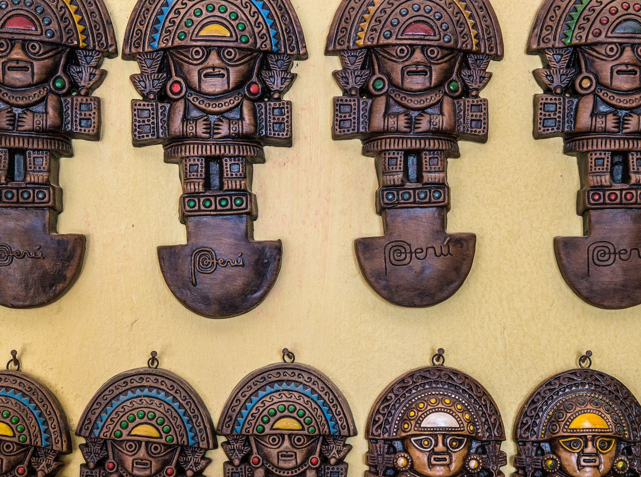 Colorful traditional Peruvian sculptures showcasing cultural heritage and artistry.